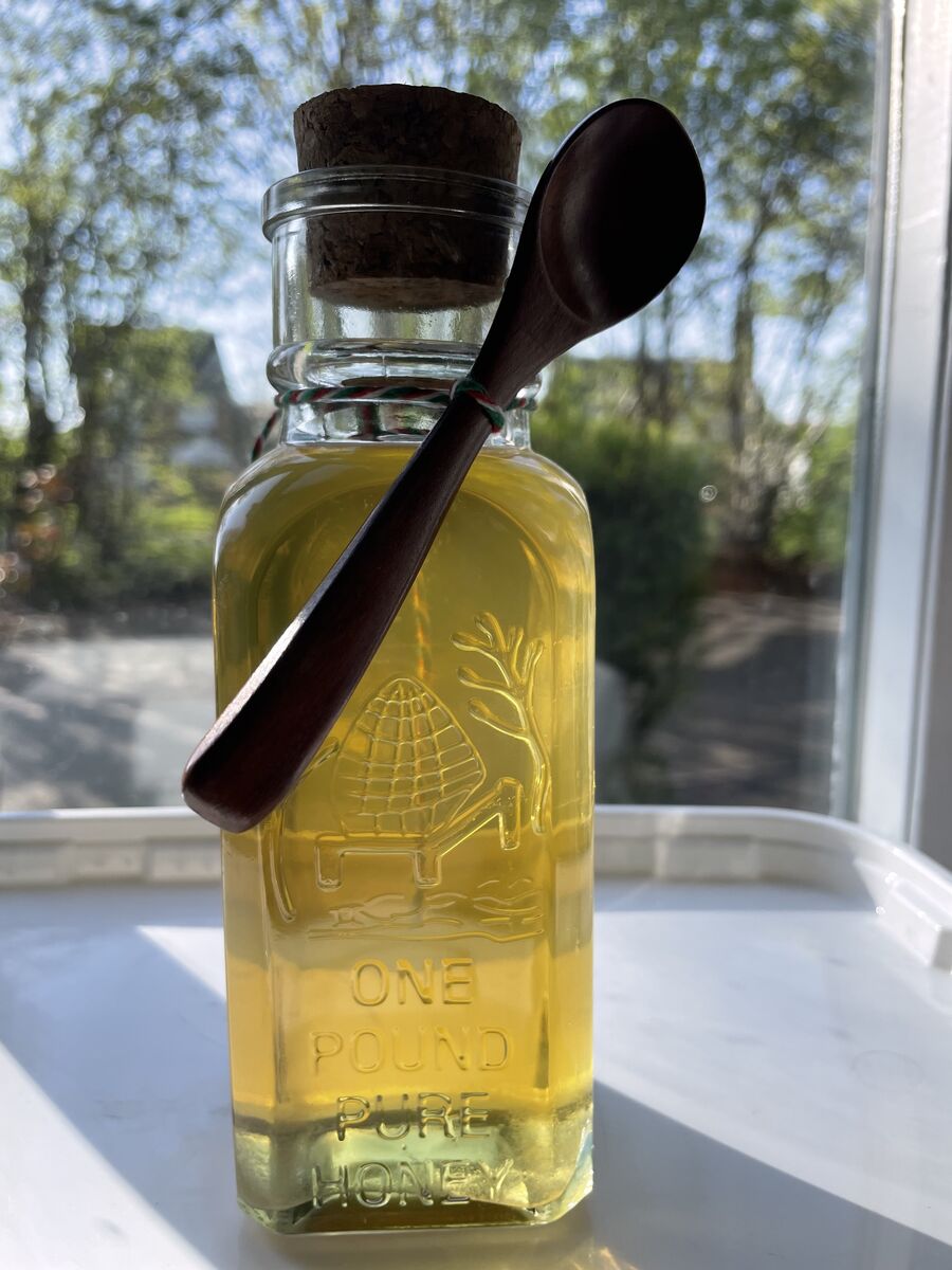 Ridgeway Honey tall gift bottle with a wooden spoon